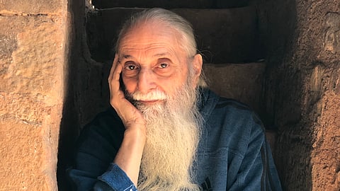 Poet Hoshang Merchant at the Jamali Kamali mosque in 2024 