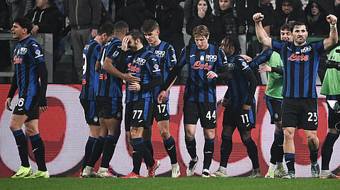Atalanta's players celebrate their team's fourth goal during the Italian Serie A first division football match between Juventus and Atalanta on March 9, 2025.