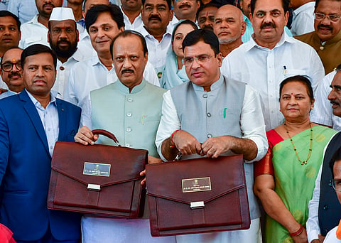 Maharashtra Deputy Chief Minister Ajit Pawar and MoS for Finance Ashish Jaiswal arrive to present the state Budget 2025-26 during the Budget session in Mumbai (Photo | PTI)