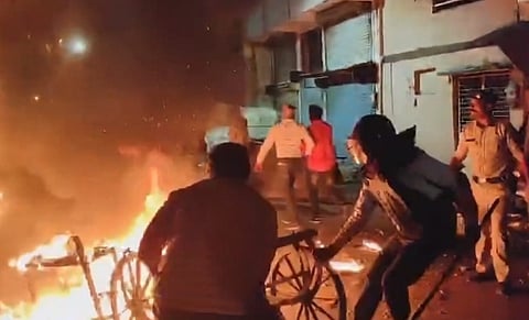 Police personnel after clashes that broke out during a rally celebrating the Indian team's victory over New Zealand in the Champions Trophy final, in Mhow, Madhya Pradesh, Sunday, March 9, 2025. 