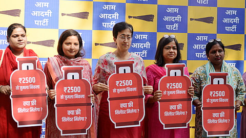 LoP in the Delhi Assembly and AAP leader Atishi during a press conference regarding the BJP-led Delhi government's promise to roll out Rs 2,500 monthly financial assistance to women, in New Delhi.
