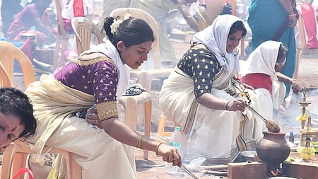 Women group of all ages cook 'pongala' during the 'Attukal Pongala Mahotsavam' in binny mills ground.  
