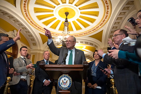 Sen. Charles Schumer, D-N.Y., speaks to reporters after a Senate policy luncheon on Capitol Hill, Tuesday, March 11, 2025, in Washington. 