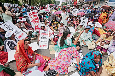 ASHA workers demonstrate in front of the Secretariat on Monday