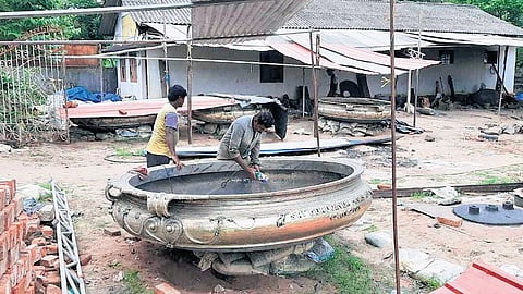 Workers engaged in manufacturing brass metal utensils in Mannar 