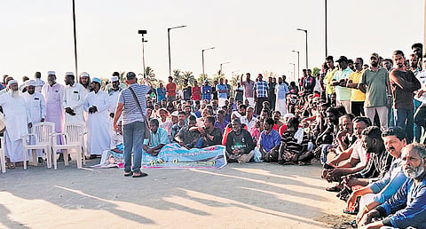 Fishermen staging a dharna blocking the Perumathura-Anchuthengu Road demanding resumption of dredging at Muthalapozhi harbour mouth 
in Thiruvananthapuram on Thursday