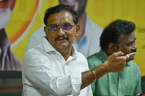 Vijayawada MP Kesineni Sivanath addressing the media during the press conference on Friday. 