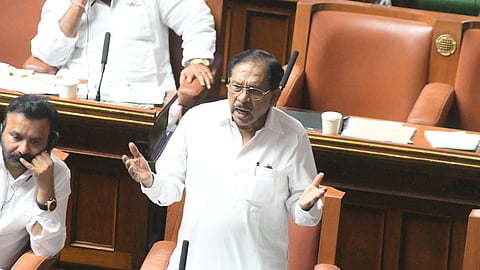 Home Minister Dr G Parameshwara speaks during a debate on the attempted  honey trapping of a minister in the Legislative Assembly on Thursday.