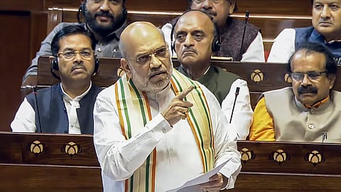  Union Home Minister Amit Shah speaks in the Rajya Sabha during the Budget session of Parliament, in New Delhi, Friday, March 21, 2025.
