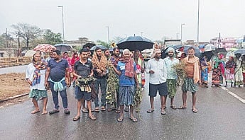 Farmers of Bangiriposi protesting on NH-49 on Saturday.  
