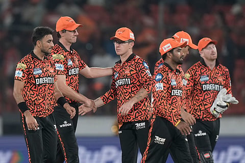 Sunrisers Hyderabad's captain Pat Cummins and teammates celebrate their win over Rajasthan Royals' in the Indian Premier League cricket match between Sunrisers Hyderabad and Rajasthan Royals in Hyderabad, Sunday, March 23, 2025. 