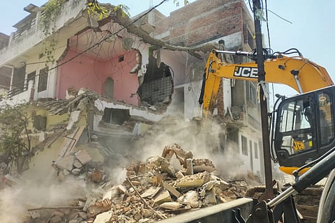 The house of Fahim Khan, alleged mastermind behind the Nagpur riots, being demolished, after he failed to remove an illegal structure within a 24-hour deadline, in Nagpur, Monday, March 24, 2025. 