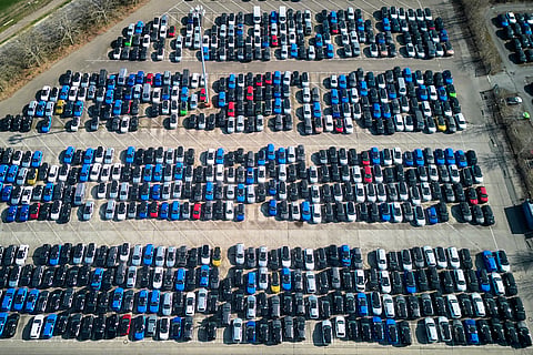 Opel cars are parked on the ground of the Opel car factory in Ruesselsheim near Frankfurt, Germany, Thursday, March 27, 2025.