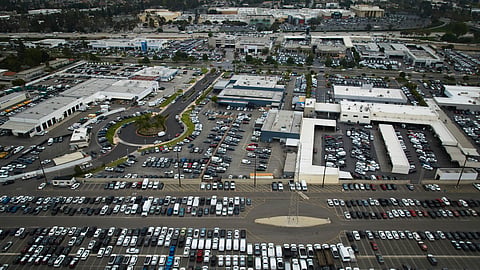 An aerial view shows auto dealerships in Cerritos, Calif., Thursday, March 27, 2025. 