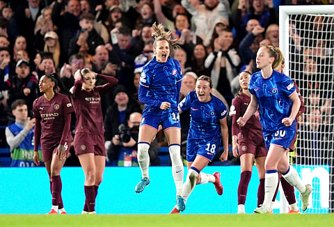Chelsea's Nathalie Bjoern, front center, celebrates scoring her side's second goal during the Women's Champions League, quarter-final second leg, soccer match between FC Chelsea and Manchester City in London, England, Thursday, March 27, 2025. 