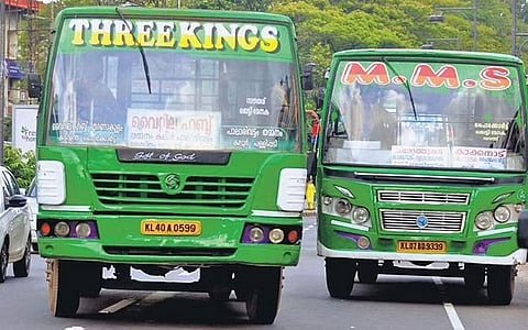 A private bus overtaking another at the High Court junction, one of the most crowded places in Kochi