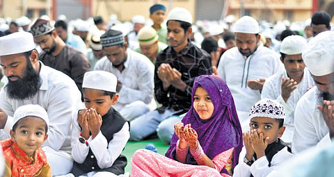 Muslim devotees offer special prayers at IGMC stadium on Monday 