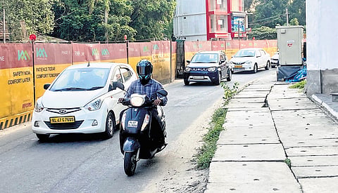 The narrow stretches at Alinchuvadu and Vazhakala, where metro work is progressing 