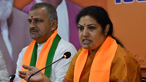 BJP state president and MP Daggubati Purandeswari addressing the party's cadre during the state level meeting at the Central office in Vijayawada on Monday. 