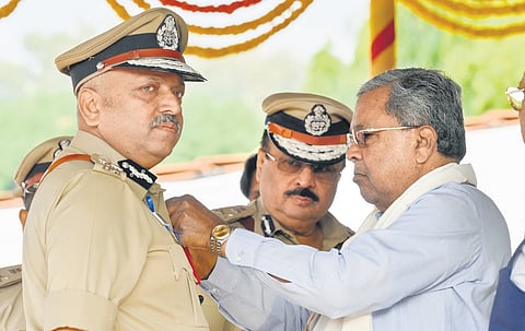 CM Siddaramaiah presents Chief Minister’s medal to Hemant Nimbalkar, ADGP Intelligence, at KSRP Parade Ground in Koramangala on Wednesday 