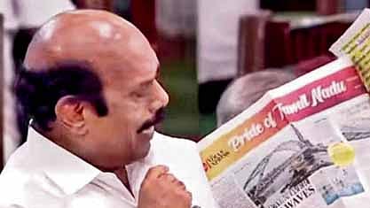 Highways Minister E V Velu displays a copy of TNIE’s ‘Pride of Tamil Nadu’ edition in the TN Assembly