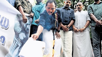 Muslim Youth League members protest against the Bill at Mananchira 