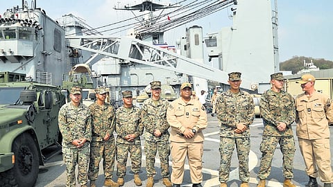 US Navy personnel leading a tour of the USS Comstock (LSD 45) at Visakhapatnam Port on Friday as part of the Tiger Triumph exercise 