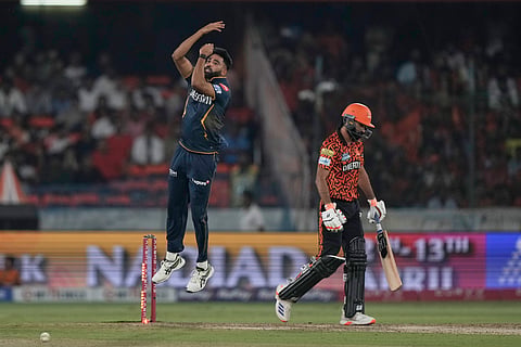 Gujarat Titans' Mohammed Siraj celebrates the wicket of Sunrisers Hyderabad's Simarjeet Singh during the Indian Premier League cricket match between Sunrisers Hyderabad and Gujarat Titans at Rajiv Gandhi International Cricket Stadium in Hyderabad, India, Sunday, April 6, 2025. 