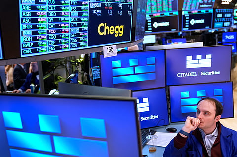 Joseph Maguire works on the floor at the New York Stock Exchange in New York, Tuesday, April 8, 2025. 
