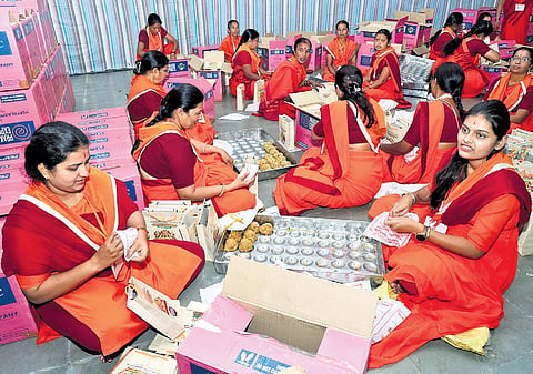 Women packing 70,000 laddus at Tirumala on Wednesday 