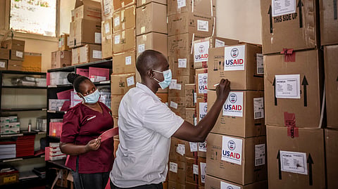 Members of the pharmacology department take inventory of the last boxes of drugs delivered by the now-dismantled United States Agency for International Development (USAID) amid medical supply shortages in a pharmacy storeroom at Lodwar County Referral Hospital in Lodwar on April 1, 2025. 