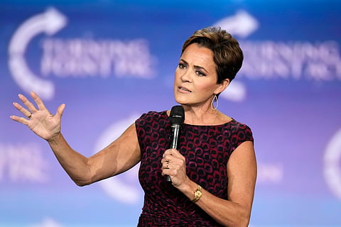 Kari Lake speaks to supporters at a campaign event