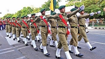 A parade featuring contingents of college students and police personnel took place on Rabindra Mandap-Jayadev Bhawan stretch.