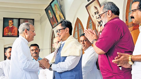 Union Minister for Minority Affairs Kiren Rijiju being welcomed by Archbishop Joseph Kalathiparambil when the former visited the Archdiocese of Verapoly 
on Tuesday.