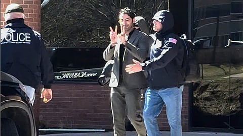 Mohsen Mahdawi, a Palestinian man who led protests against the war in Gaza as a student at Columbia University, is detained at the US Citizenship and Immigration Services office in Colchester, Vt., on Monday, April 14, 2025.