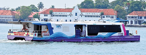 A Water Metro vessel sailing through the Kochi backwaters