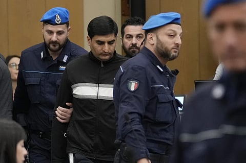Nomanoulaq Nomanoulaq arrives at a hearing of the trial for the alleged murder of his cousin, Pakistani-born Saman Abbas at Reggio Emilia’s courthouse in northern Italy, Feb. 10, 2023. 
