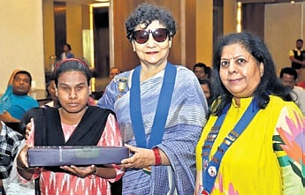 Members Tangent Bhubaneswar distributing  Jyoti Ai Smart Glasses to visually impaired people in Bhubaneswar on Saturday. 
