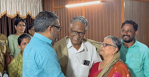  V V Balakrishnan and his wife Remadevi, who handed over one acre of land to shelter 20 families, being felicitated by LSG Minister M B Rajesh at a function held in Chathannur, Palakkad, on Sunday