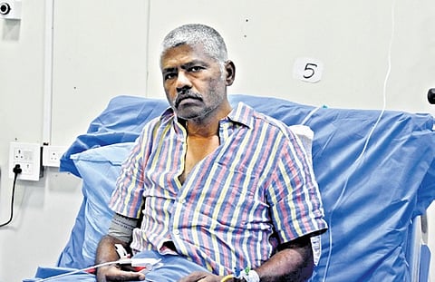 Balachandru, a tourist from Madurai, undergoing treatment at a hospital in  Anantnag 