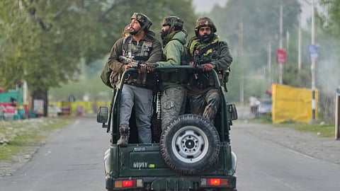Indian Army soldiers patrol in armoured vehicle near Pahalgam in south Kashmir after the terror attack on tourists. 