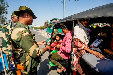 Amritsar: BSF jawans check documents of Pakistani nationals as they arrive at the Integrated Check Post at the Attari-Wagah border to move to their country, near Amritsar, Saturday, April 26, 2025. India has announced the closure of the Attari border for all movement as part of heightened security measures following the Pahalgam terror attacks. 