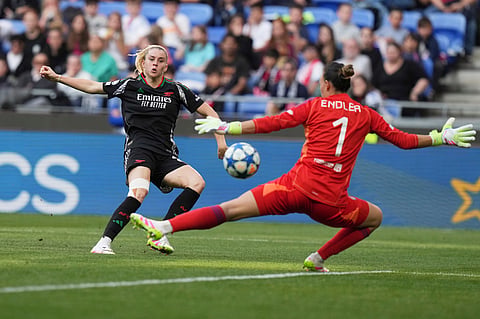 Arsenal's Alessia Russo scores her side's third goal during the women's Champions League semifinals, second leg, soccer match between Olympique Lyonnais and Arsenal at OL Stadium in Decines, outside Lyon, France, Sunday, April 27, 2025. 