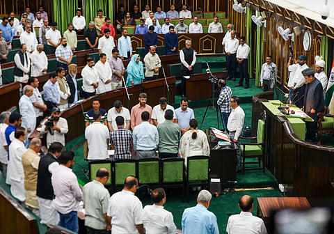 Jammu and Kashmir Chief Minister Omar Abdullah with MLAs observes silence to pay tributes to the victims of Pahalgam terror attack during the one-day special session of the J&K Assembly, in Srinagar, Monday, April 28, 2025. 
