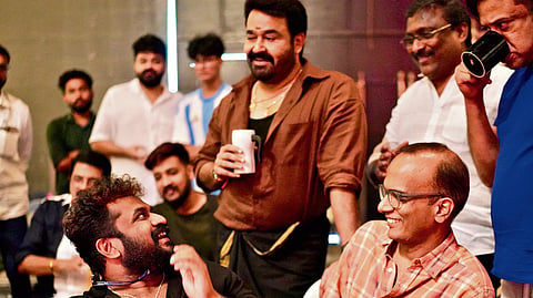 Director Tharun Moorthy and K R Sunil with Mohanlal 