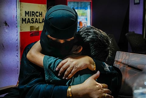 A Pakistani national, with her son as she waits to cross over to her country, at the Attari-Wagah border checkpost near Amritsar, Tuesday, April 29, 2025.(Representative Image)