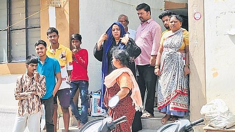 Illegal occupants of the 2BHK Dignity Housing Colony, Old Marredpally, Secunderabad, vacate the premises on Monday.