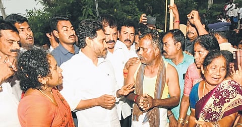 Jagan Mohan Reddy condemned the decision to make  devotees stand in line adjacent to the unstable wall amid heavy rain.