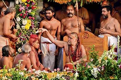Sri Kanchi Kamakoti Peetham Seer Jagadguru Sri Shankara Vijayendra Saraswathi Swamigal performs Sanyasa Deeksha ritual on Sri Duddu Satya Venkata Surya Subramanya Ganesha Sharma Dravid to anoint him as the next Shankaracharya of the Peetam.