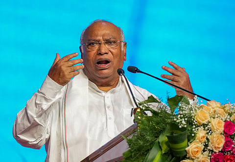 Congress President and Leader of Opposition in Rajya Sabha Mallikarjun Kharge addresses an event to regularise the service of 'Pourakarmikas', civic workers, under the Bruhat Bengaluru Mahanagara Palike (BBMP), in Bengaluru, Karnataka, Thursday, May 1, 2025. 